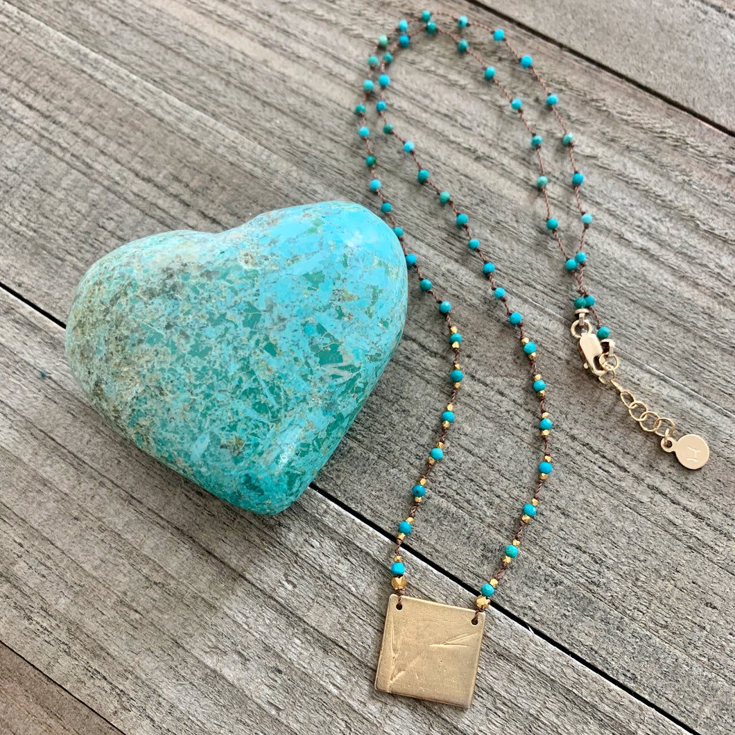 Knotted Turquoise Necklace with a 14K Gold Filled Decorative Charm