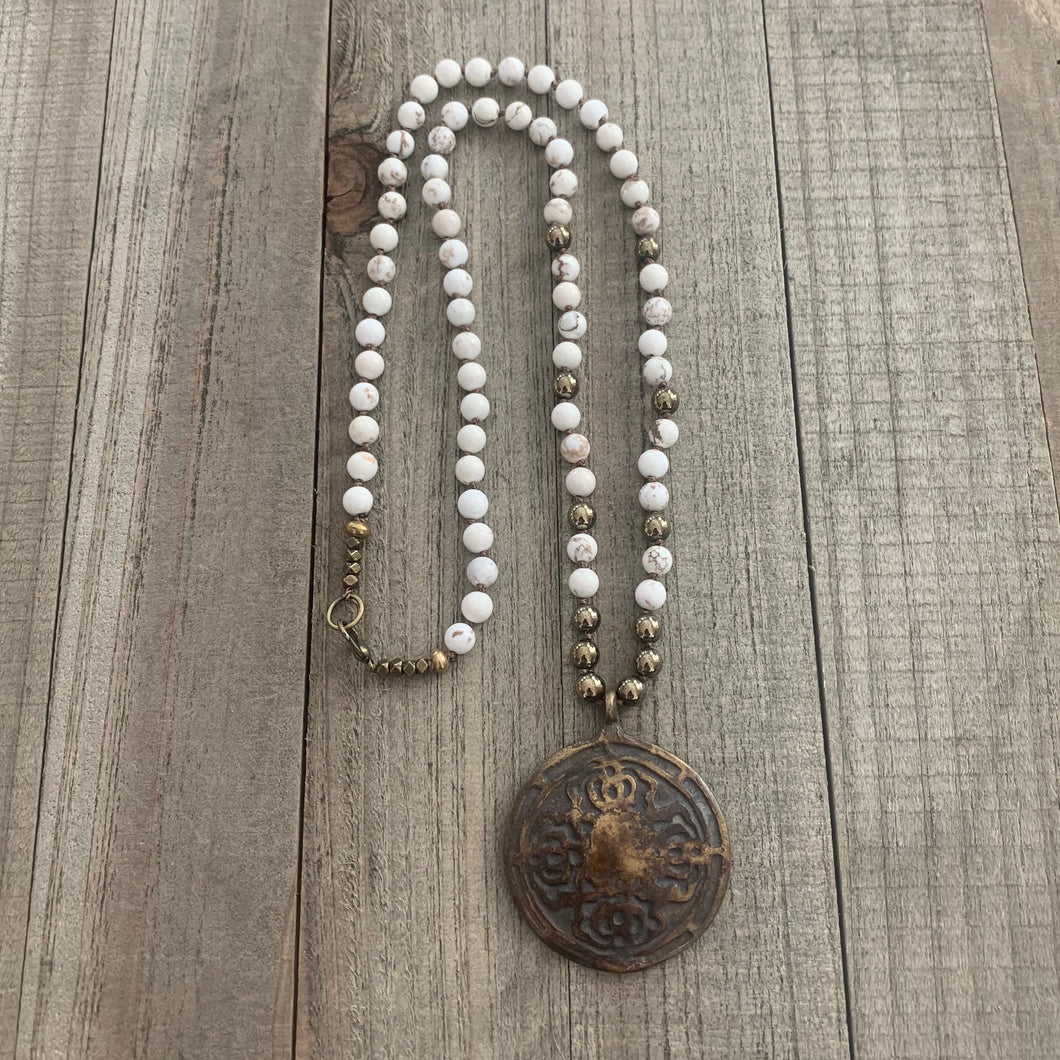 White Turquoise and Hematite Knotted Necklace with a Large Brass Charm